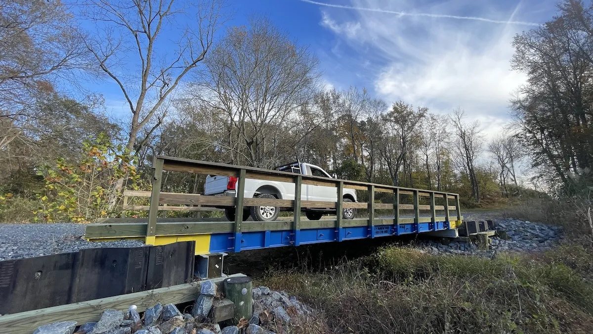 E&H timber bridge installed at Lakeside at Trappe with truck crossing