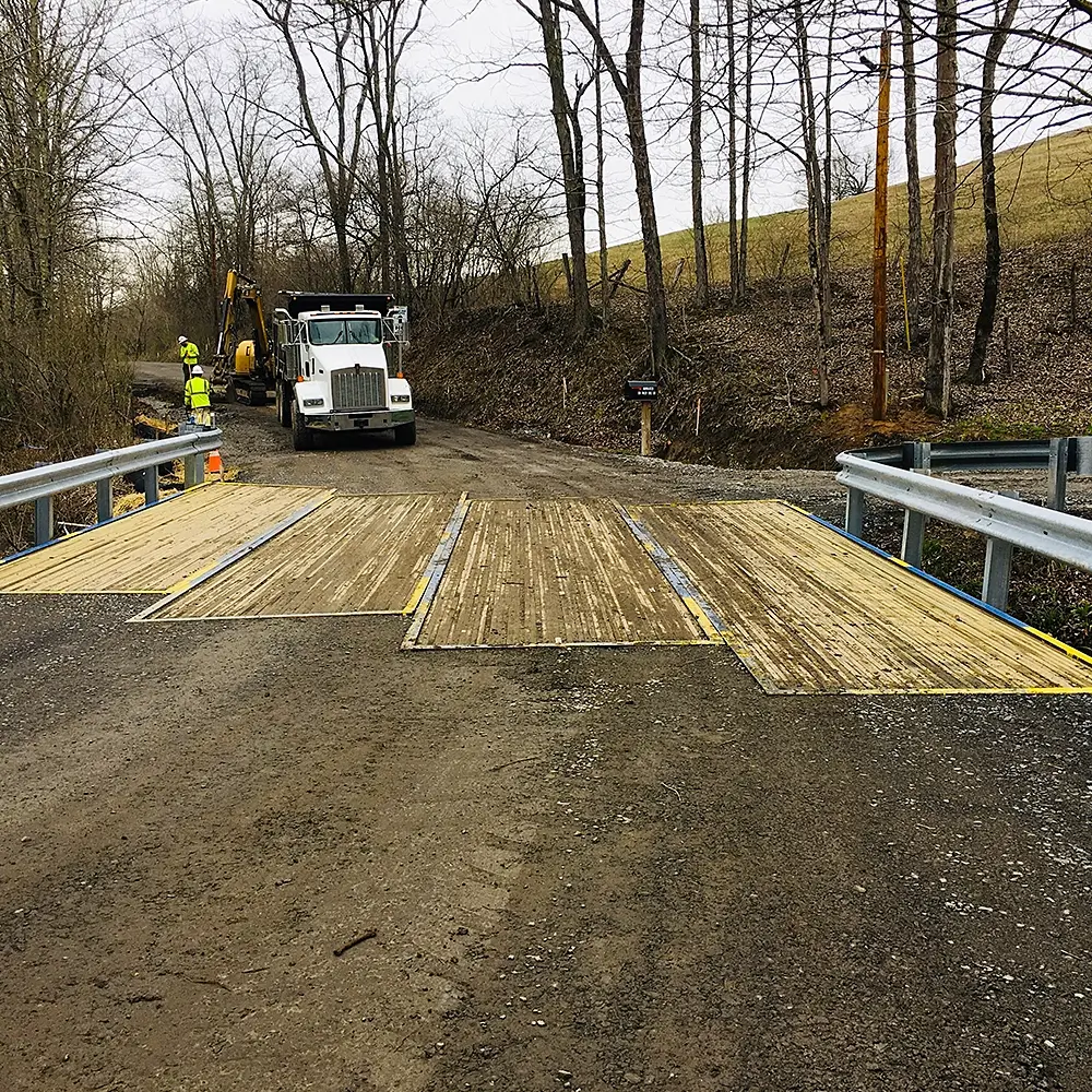 Finished bridge with truck crossing