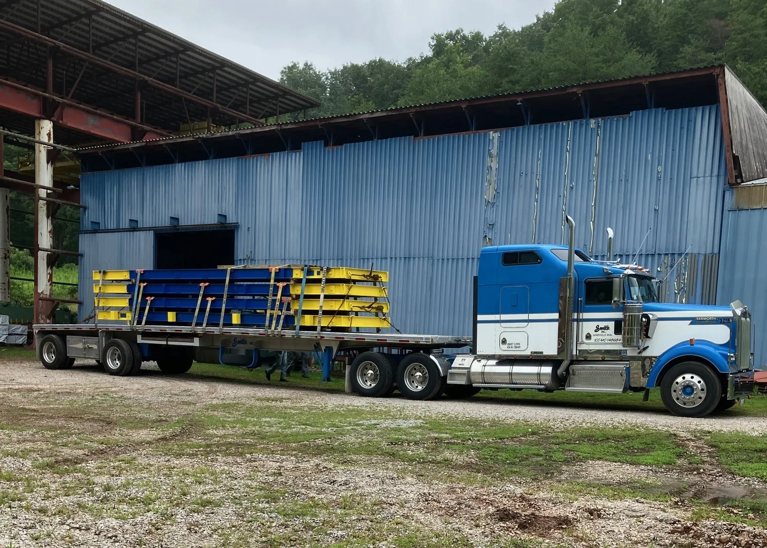 Bridge panels loaded on flatbed trailer