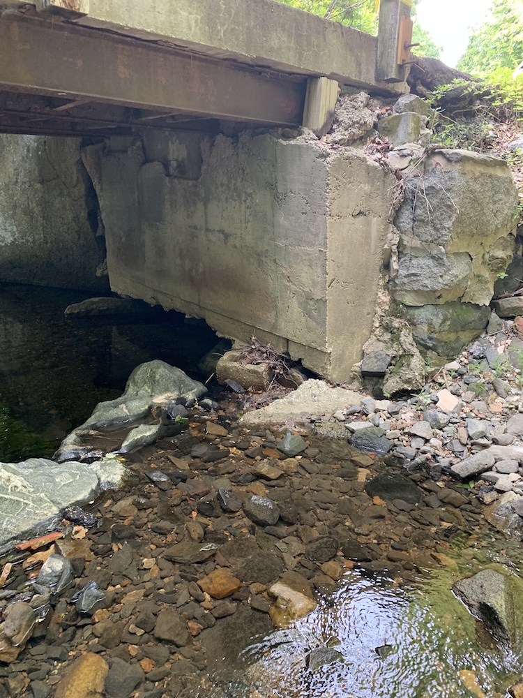Streambank erosion and undermined footing