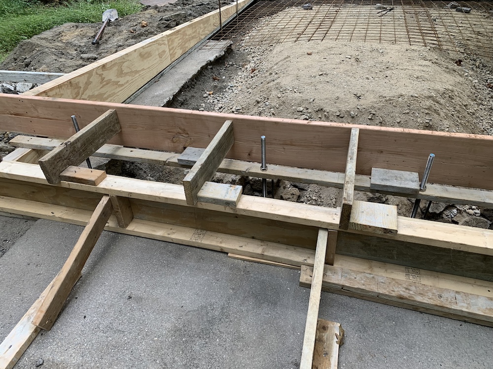 Close-up of anchor bolts in formwork