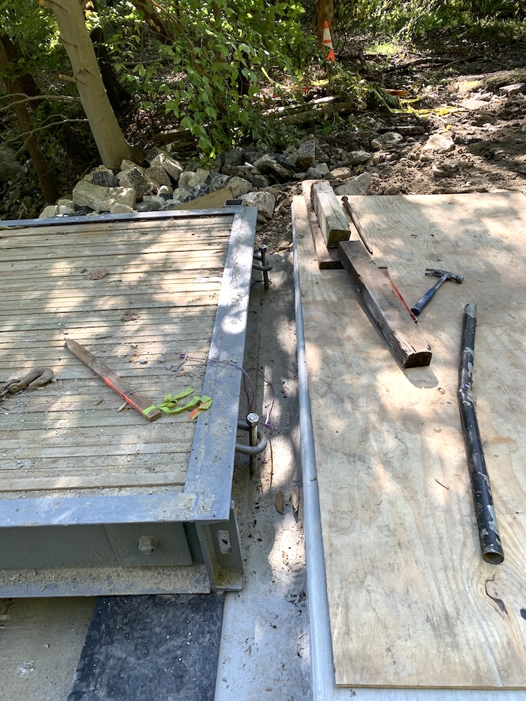 Bridge panel being fitted to concrete approach