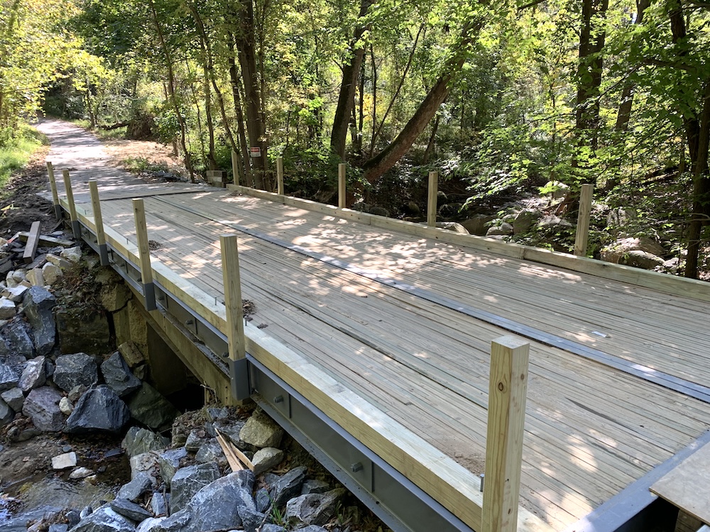 Completed bridge deck with timber curbing